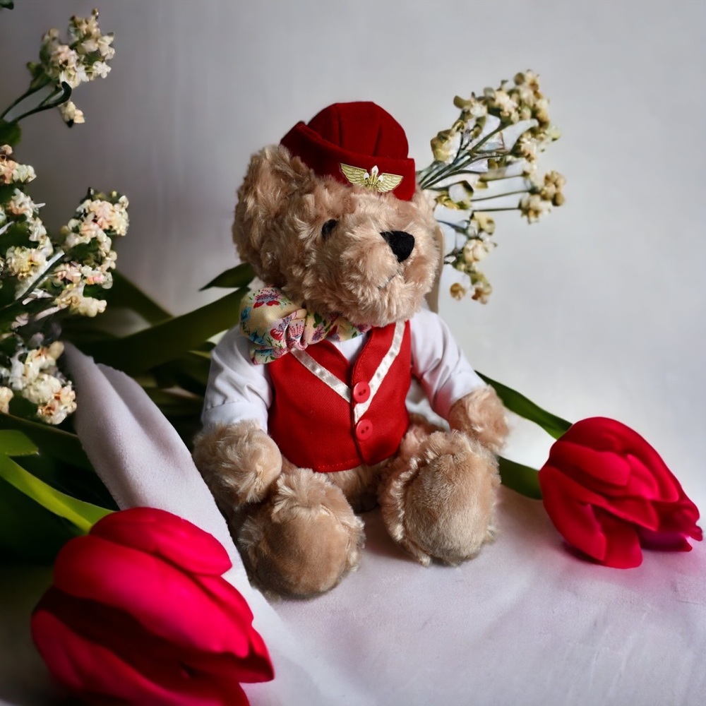 Flight attendant teddy bear with wings and scarf